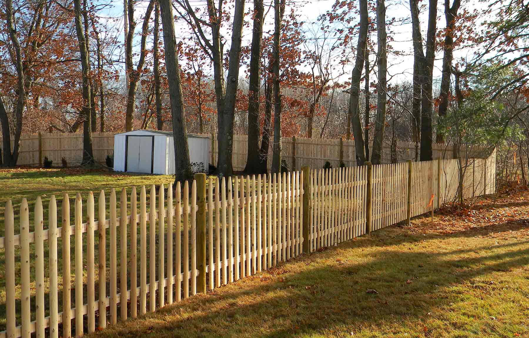 Wood Open Spaced Picket Fence Installation in Massachusetts - Bottom 2